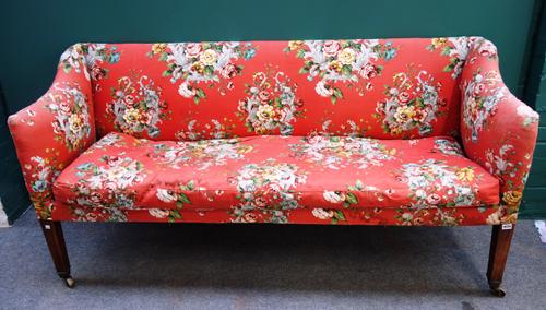 A George III square back sofa, with downswept arms, on square supports, 180cm wide x 90cm high.