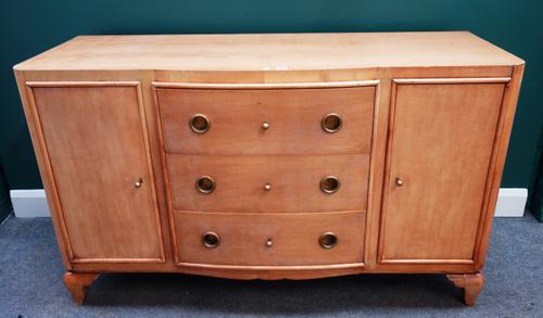 'Rinck, 115 FRG St, Antoine, Paris', a 20th century birch bowfront sideboard, 150cm wide x 55cm deep.