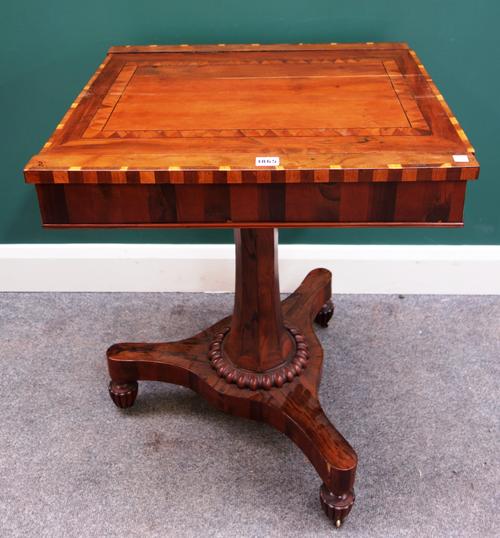 A Regency inlaid yew games table, possibly Killarney, with reversible chessboard top, on octagonal column, 56cm wide x 61cm long.