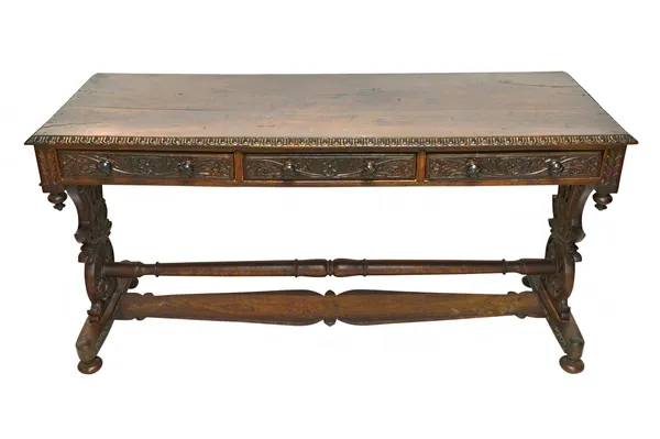 A 19th century Spanish carved rosewood three drawer side table, on trestle supports, 148cm wide x 76cm high.  Illustrated