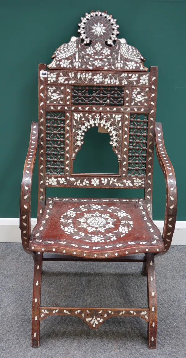 An early 20th century Syrian mother of pearl inlaid folding chair, 54cm wide x 123cm high together with another similar, 62cm wide x 108cm high, (2).