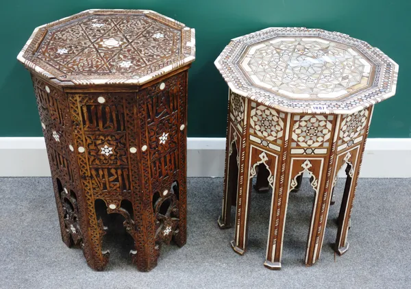 An early 20th century Syrian mother of pearl inlaid octagonal table 44cm wide x 53cm high together with another similar, 42cm wide x 58cm high. (2)