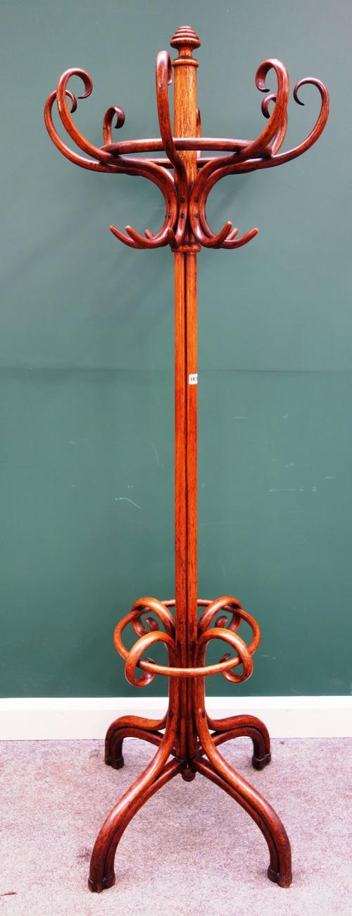 An early 20th century bentwood coat/hat stand, 200cm high, together with a bamboo hexagonal occasional table, 51cm wide x 90cm high, (2).