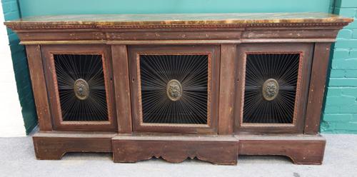 A mid 19th century French breakfront side cabinet, with faux marble top over grille doors, 216cm wide x 104cm high.