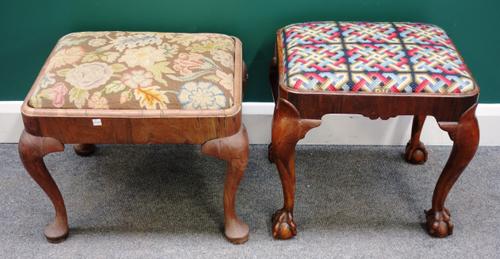 An 18th century and later walnut footstool on ball and claw feet, 46cm wide x 46cm high, together with another smaller, 51cm wide x 42cm high (2).