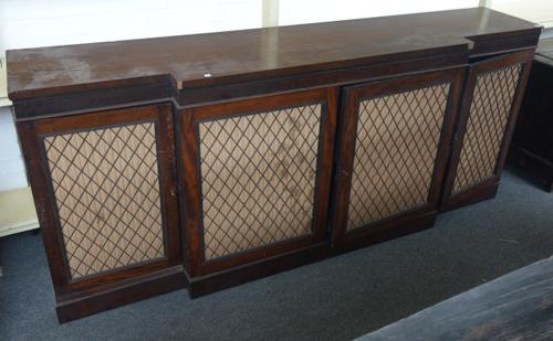 A 19th century and later mahogany brass grille breakfront four door side cabinet, 210cm wide x 92cm high.
