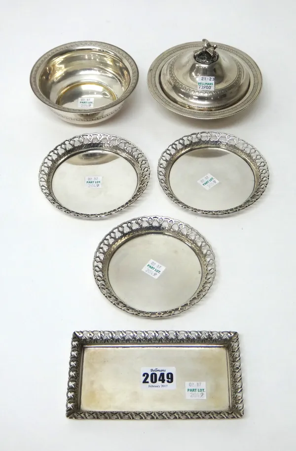 Foreign wares, comprising; an Egyptian rectangular dish, decorated with a cast and pierced border, three matching circular dishes, decorated with pier