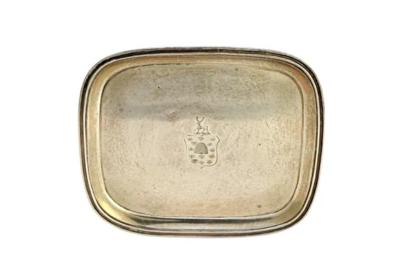 A George III silver teapot stand, of curved rectangular form, engraved with a shield and a crest, fitted with a wooden base, maker John Emes, London 1