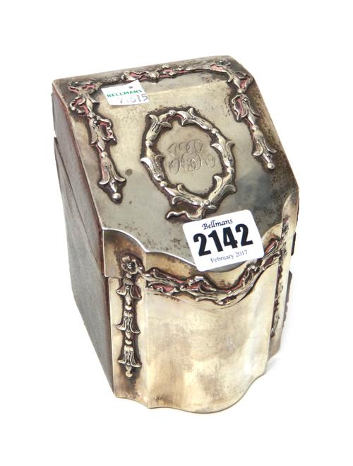 A silver mounted leather playing cards box, modelled as a late 18th century slope fronted knife box, decorated with applied mounts, by Goldsmiths & Si