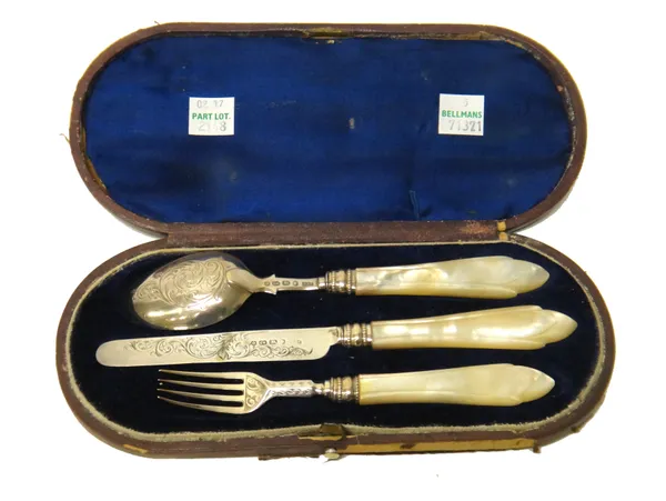 A Victorian silver three piece christening set, comprising; a knife, a fork and a spoon, having engraved decoration and with mother of pearl handles,