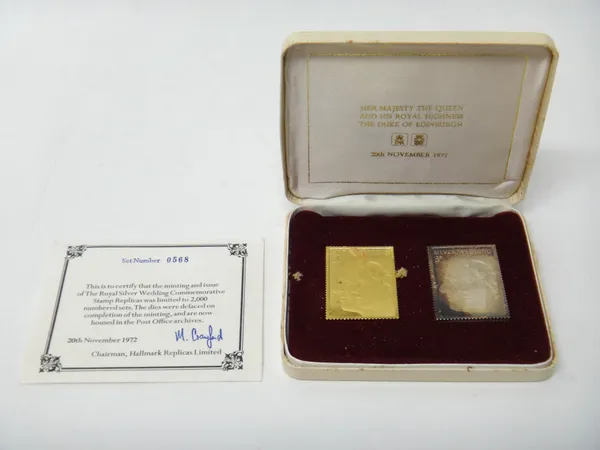 A 22ct gold replica twenty pence postage stamp ingot and a silver replica three pence postage stamp ingot, commemorating The Royal Silver Wedding of 2