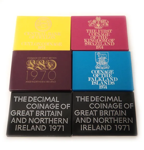 Four Great Britain year type proof specimen coin sets, comprising; two 1970 and two 1971 and six foreign year type proof specimen coin sets, comprisin