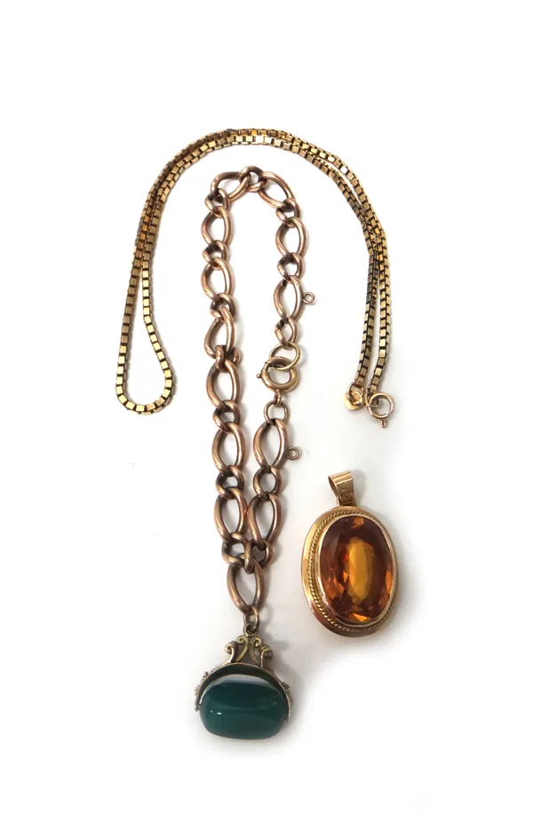 A gold large and small curb link bracelet fitted with a 9ct gold mounted triple sided rotating pendant fob, a 9ct gold box link neckchain on a boltrin