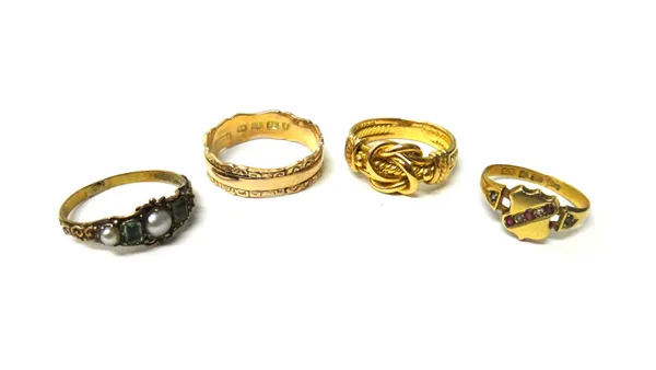 A Victorian 18ct gold ring, in an entwined knot and ropetwist design, Chester 1897, weight 5.7 gms, a 12ct gold band ring, with decorated wavy sides,