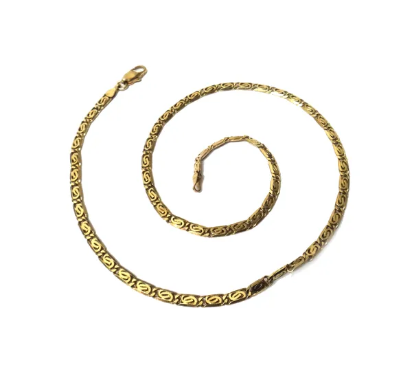 A gold neckchain, in a multiple link design, detailed 585, on a sprung hook shaped clasp, weight 12.3 gms.