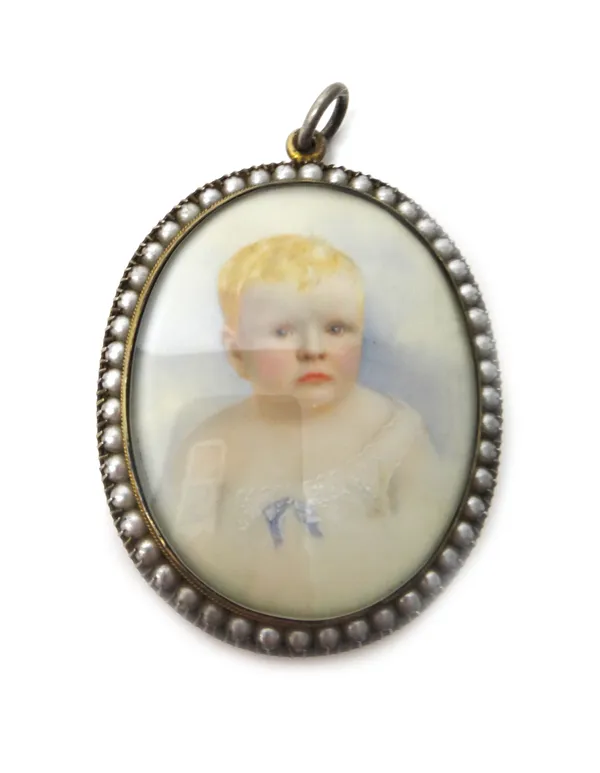 A Victorian gold mounted oval shell cameo brooch carved as a portrait of Medusa, the back glazed with an oval portrait miniature of a lady with black