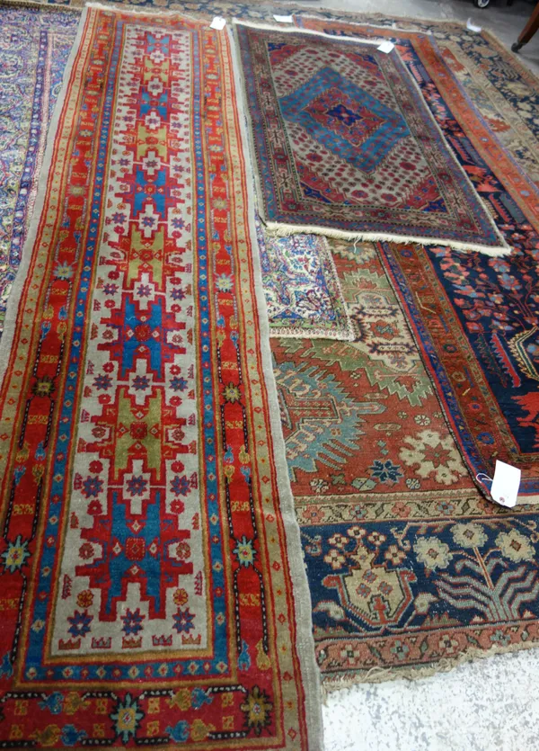 A Kashmir needlework carpet, with fifteen floral panels, 256cm x 176cm.  K9