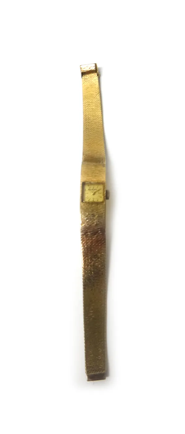 A lady's 9ct gold Bueche-Girod bracelet wristwatch, the signed square dial with gilt baton numerals, on a textured tapering link bracelet, with a slid