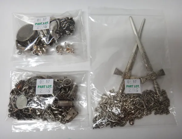 Silver and other jewellery, comprising; two charm bracelets, five bracelets and chains, five pendants and lockets, a necklace designed as two crossed