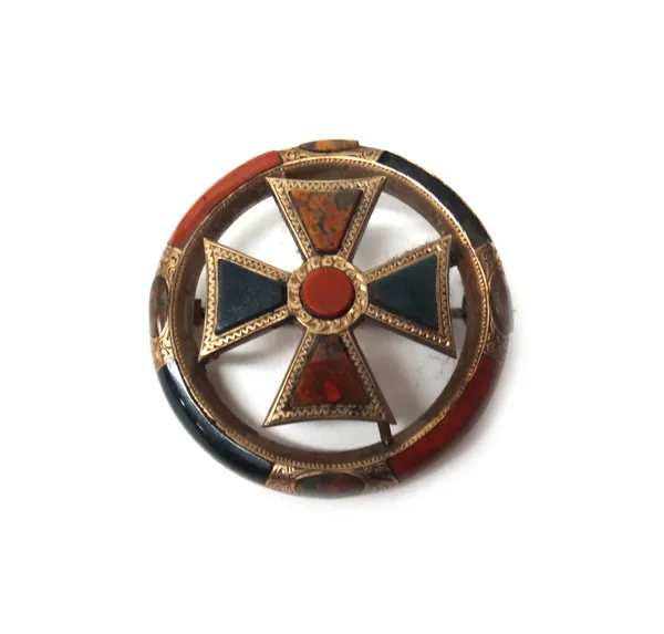 A bloodstone, jasper and vary coloured agate set brooch, of circular openwork form, with a cruciform motif to the centre, probably Scottish, second ha