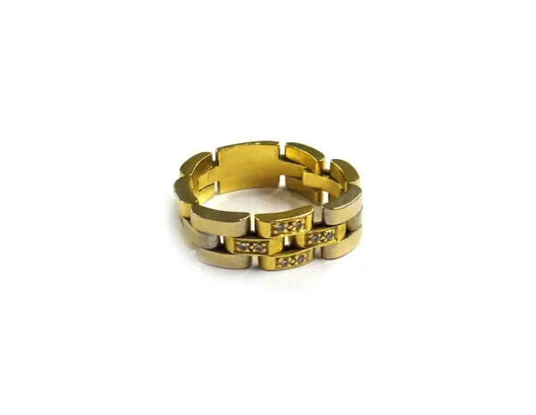A two colour gold and diamond set ring, in a curved chain link design, the four front links fronted with pairs of circular cut diamonds, ring size T,