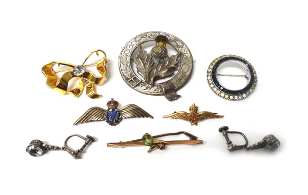 A gold and pale blue gem set brooch, designed as a tied bow, two R.A.F brooches, three further brooches and a pair of colourless paste set pendant ear