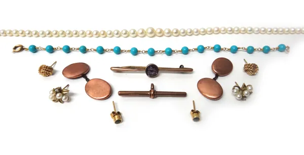 A single row necklace of graduated cultured pearls on a marcasite set clasp, a 9ct gold T bar, three pairs of earstuds, a gold and amethyst set single