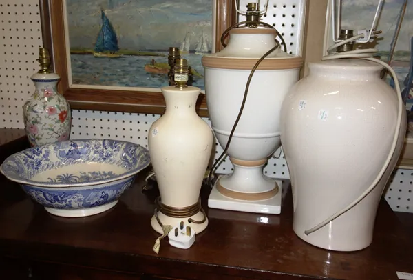 A large white glazed urn style lamp, together with a white crackle glazed lamp, three further smaller lamps and a blue and white washbowl, (6).  DIS