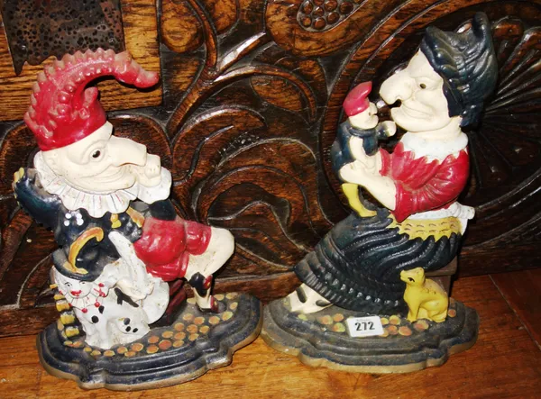 A Chinese carved hardwood figure of an Immortal, together with a Chinese doll in embroidered costume. (2)   CAB