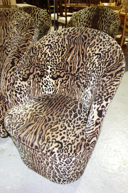 An 18th century and later large oak fire surround, with triple panel and carved decoration; overall size 169cm wide x 203cm high, aperture 107cm wide