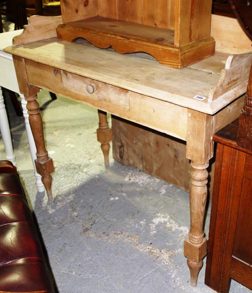 An early 20th century walnut child's high chair and a cane child's chair, (2).  F1