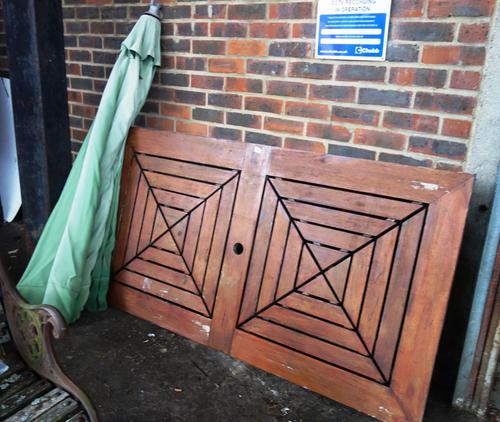 A 20th century oak and cane high back open armchair.  SH9