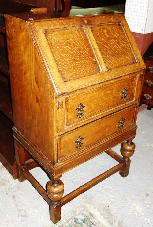 A pair of ebonised wickerwork high back chairs, possibly by Heywood Bros; a Morris style white painted three seat bench, 120cm wide; and three ebonise