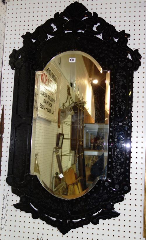A 20th century hardwood four door cupboard with lattice doors, 107cm wide x 87cm high. EXTRA