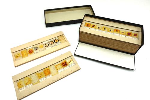 A Johann Gutle wooden polyhedral sundial, Nuremberg, late 18th century, signed J.C.Gutle Mech. Norimb. fecit.cxc, the shaped wooden base inset with co