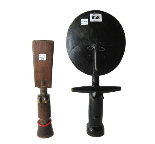 A pair of modern Chinese porcelain vases, decorated with further famille verte Wucai vases against a red ground, six character mark to base, 38cm high