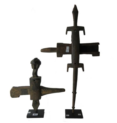 After Moreau, a pair of patinated bronze busts, 20th century, depicting a bearded gentleman and a young lady with her breasts bared, each on a taperin