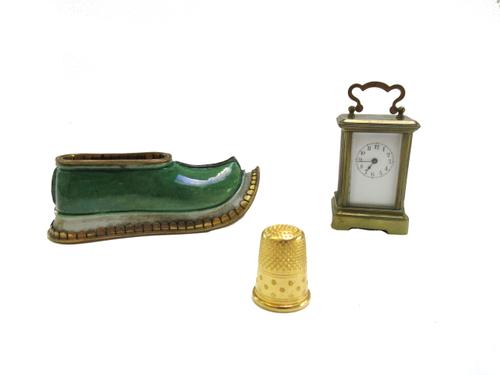 An Empire style six branch and green painted chandelier, early 20th century, with three fluted rods over a circular body issuing six scroll arms, 89cm