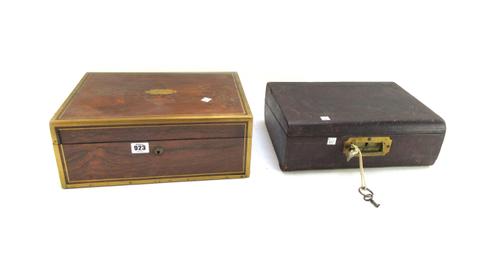 A Victorian cast iron half block lion door stop, (30cm wide), a gilt metal 'face mask' embellishment and a hardstone figure (3).