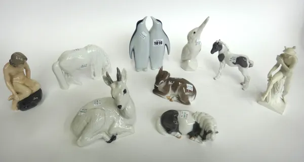 Six Royal Copenhagen porcelain animals, comprising; a fawn (2648), three horses (4653, 4616), a deer (22607) and a kingfisher (2257), a Bing & Grondha