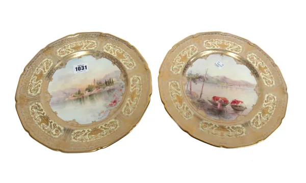 A pair of Royal Doulton bone china named view cabinet plates, 20th century, painted by P.Curnock, signed with views titled `Evening.Lago D'orta' and `