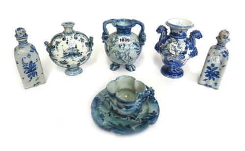 A group of Cantagalli blue and white wares, late 19th/early 20th century, comprising; a two-handled bulbous vase painted with a putto on a dolphin, 15