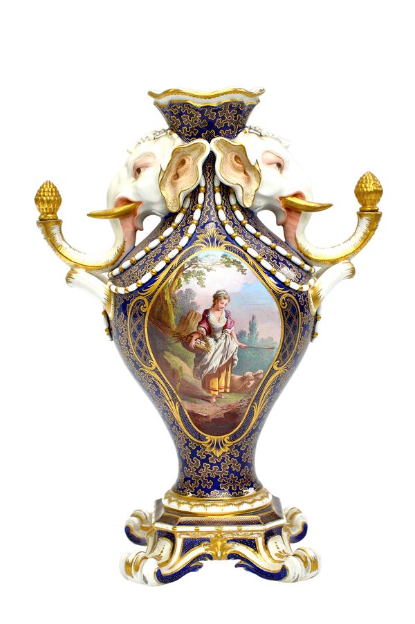 A Minton vase 'a Tête d'Eléphant', circa 1876, modelled after the Sèvres prototype, modelled with elephant heads at the neck, the body painted on one