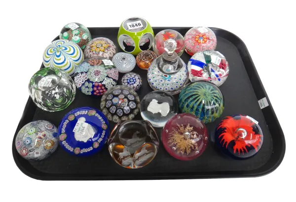 A quantity of 20th century glass paperweights, including; a Perthshire Scrambled millefiori, 6.5cm diameter, Baccarat style with a central swan inclus