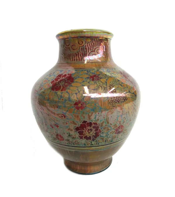 A Pilkington's Royal Lancastrian vase by Richard Joyce, circa 1912, of ovoid form with a short waisted neck, decorated in gold and red lustre with a b