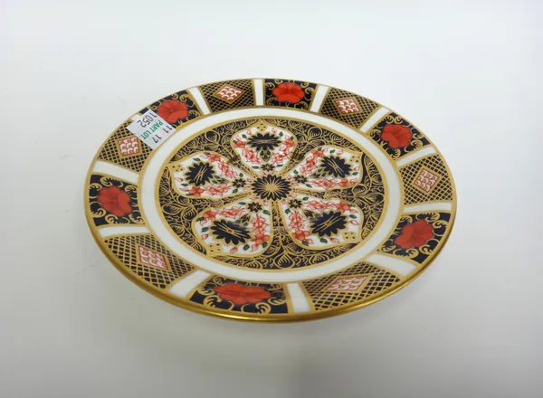 A quantity of Royal Crown Derby tea wares, decorated in varying Imari patterns, comprising; two dinner plates (26.7cm diameter), three smaller plates