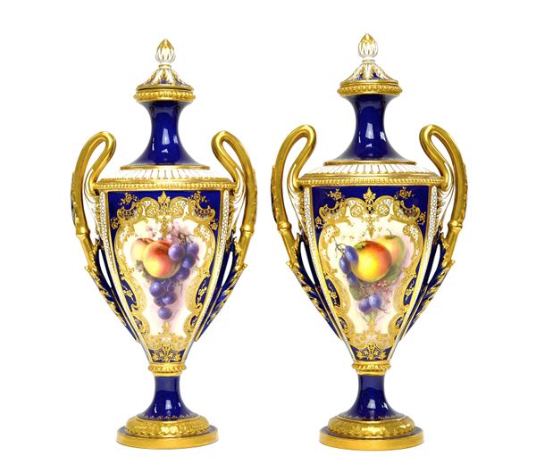 A pair of Royal Worcester two-handled vases and covers by Richard Sebright, circa 1911, each painted with a panel of fruit and flowers, signed R.Sebri