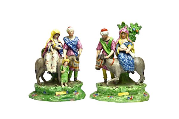 A pair of Walton style Staffordshire pottery figure groups, early 19th century, 'Flight to Egypt' and 'Return to Egypt' (a.f), 24cm high, (2).  Illust