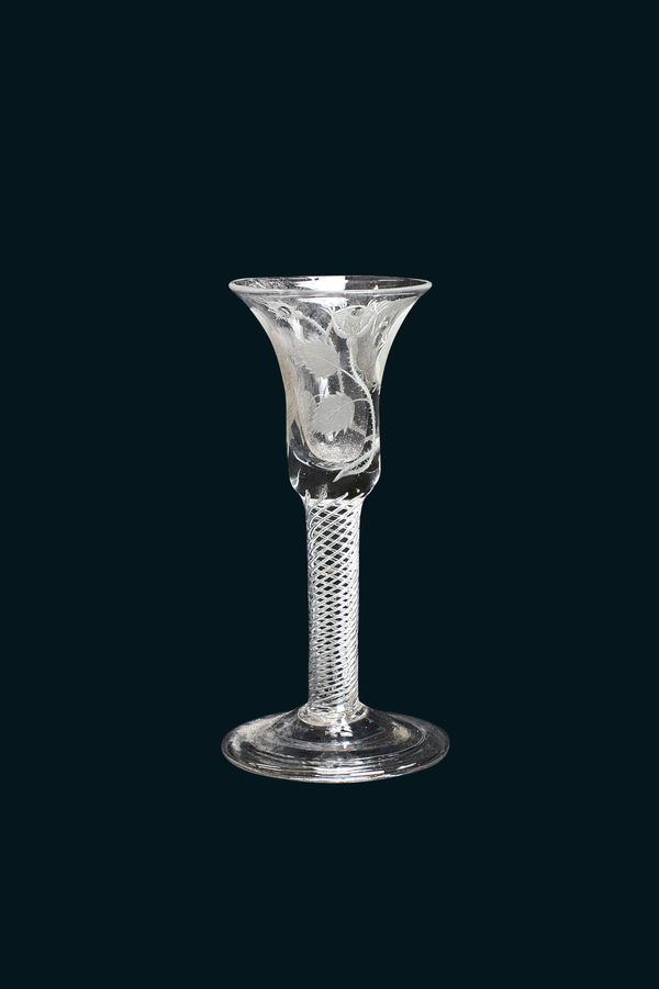 A Jacobite airtwist wine glass, mid-18th century, the bell bowl engraved with a rose, two buds, an oakleaf and star, raised on a multi series airtwist