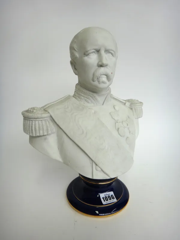 A Sevres biscuit porcelain bust depicting General Jules Forgeot, circa 1875, raised on a cobalt blue porcelain socle, printed red ground mark and S.75